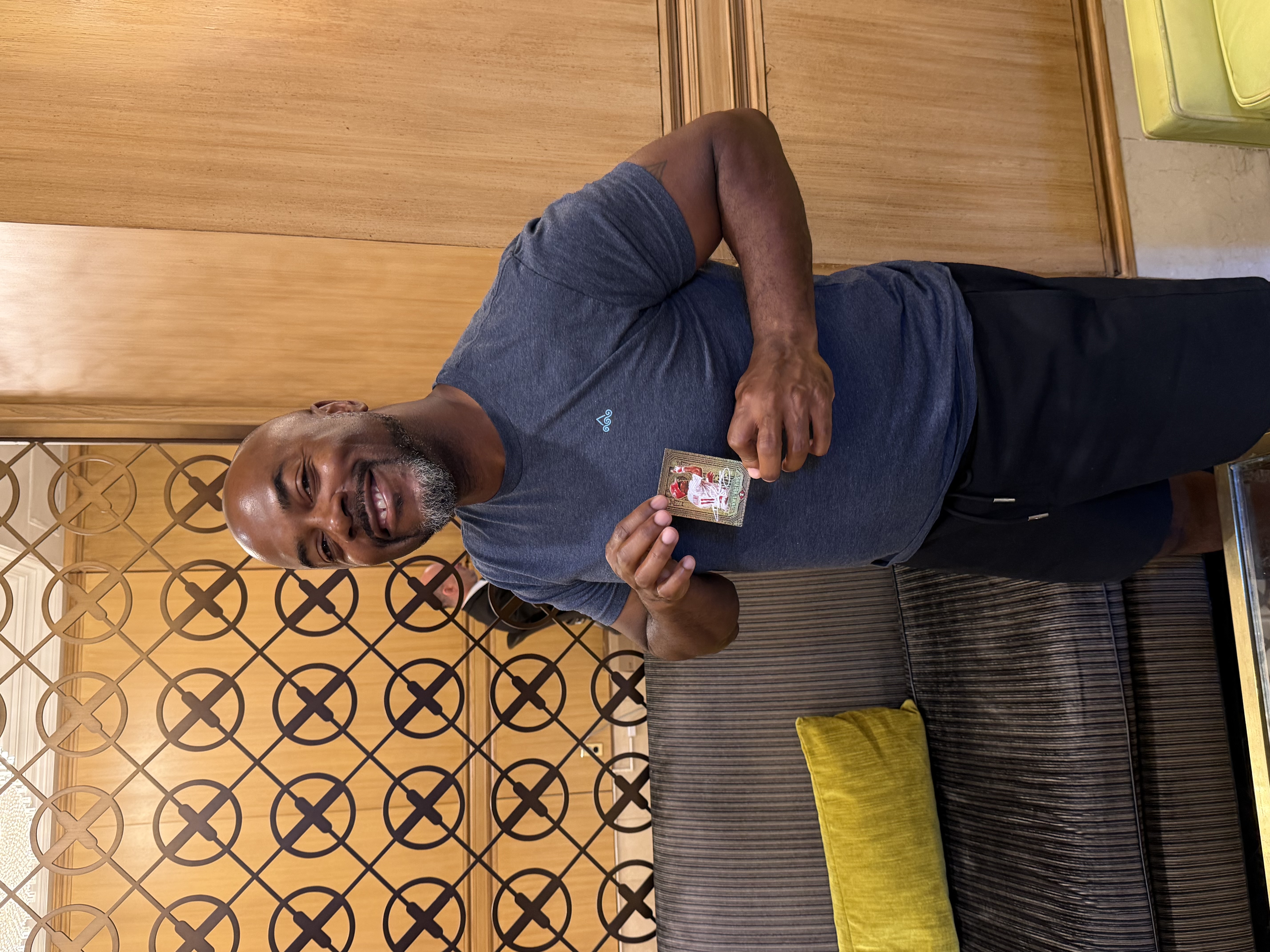 Jimmy Rollins holding a Spector Sports Art collectible card